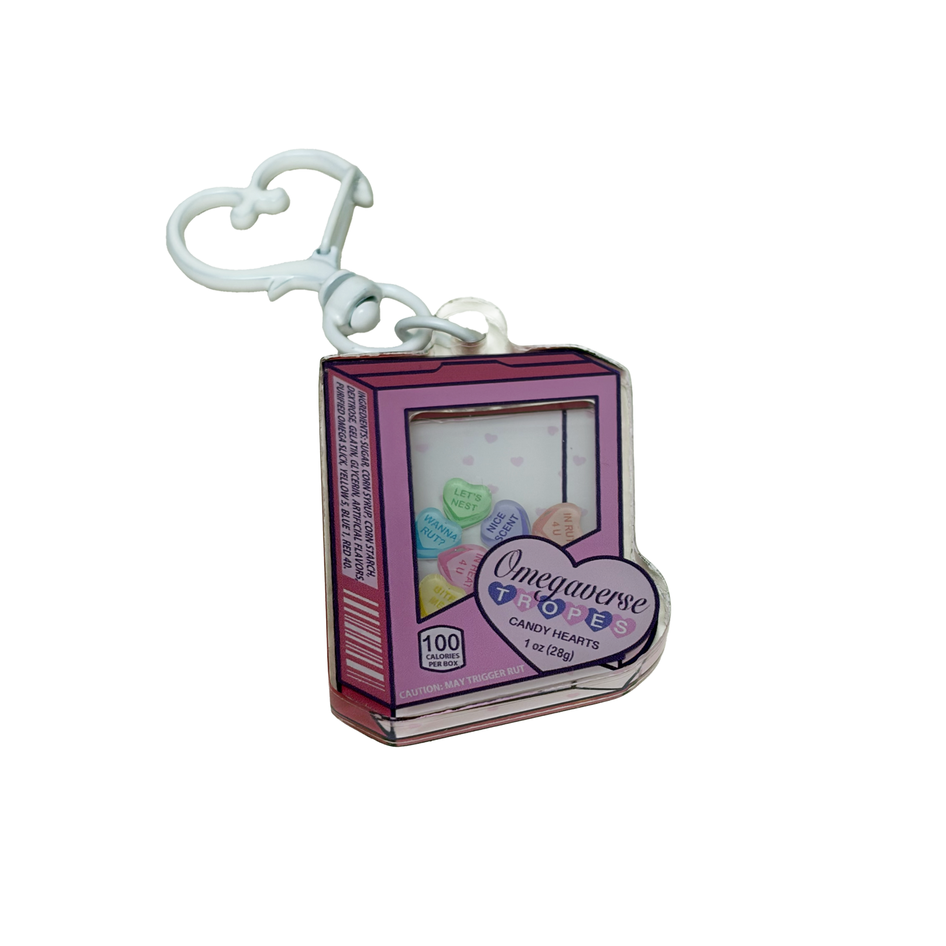 Acrylic shaker keychain shaped like a candy heart box that says omegaverse tropes. The candy hearts inside say let's nest, in rut 4 u, in heat 4 u, nice scent, bite me, and wanna rut?