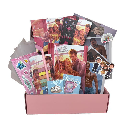 The book box contents exploding out of the pink mailer box. This book box includes the Heat Clinic special edition hardcover, enamel pin, acrylic shaker keychain, annotation tab set with pen, 2 vinyl stickers, vinyl sticker sheet, 5 vellum page overlay set, 2 bookmarks, set of 3 double sided pin up cards, and a double sided art print.